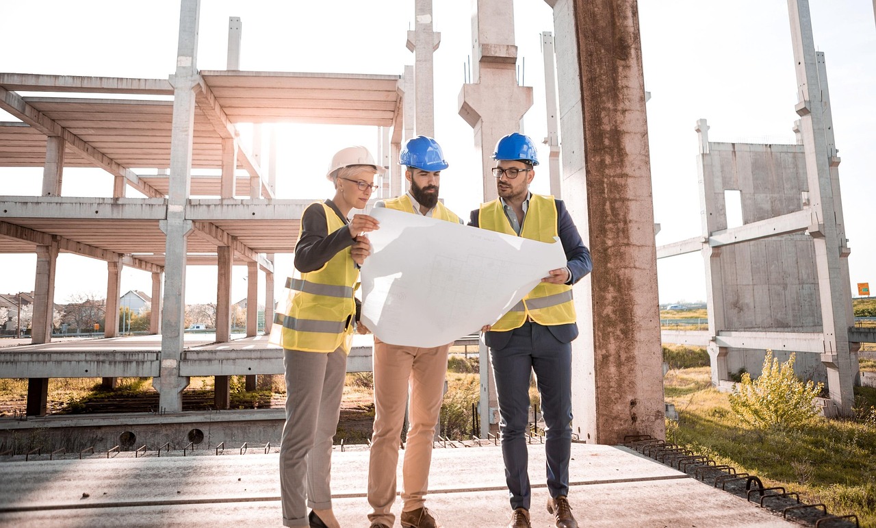 construction blueprints and hard hat